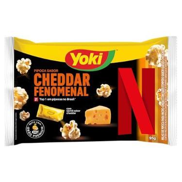 Imagem de Milho de Pipoca para Micro-Ondas Queijo Cheddar Fenomenal com Sachê Cheddar com Sal Netflix Yoki Pacote 95g Sendo 89g de Milho e 6g de Tempero
